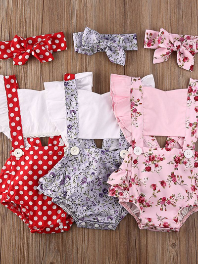 Baby overall style onesie with ruffles on the bum that ties in the back and a matching headband 