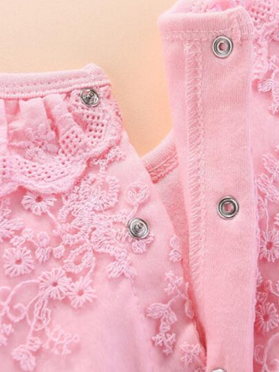 Baby set features a onesie with a tulle skirt, matching shoes, and cap