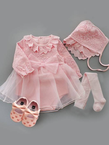Baby set features a onesie with a tulle skirt, matching shoes, and cap