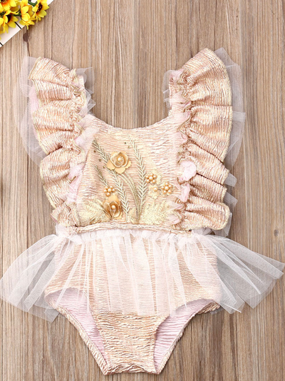 Baby ruffled tutu onesie has a cute flower applique and is a pullover style dusty pink