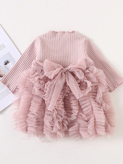 Baby Spring sweater dress features long sleeves with a ruffled tulle skirt and front bow