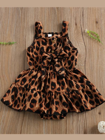 Baby romper dress with leopard print and front snap closure