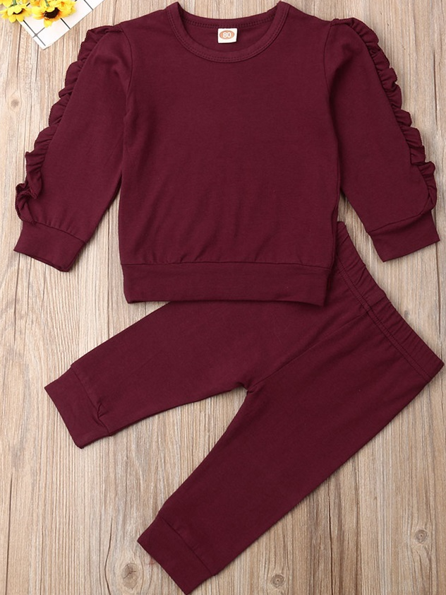 Baby set features a long-sleeved top with ruffled sleeves and leggings