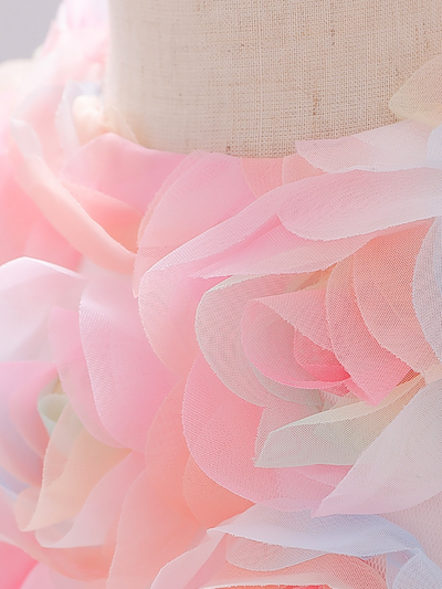 Baby Spring tulle dress' bodice has a delicate flower applique in tulle, has a multicolor layered skirt and bow at the back