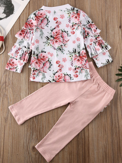 Baby set features a long-sleeved ruffled top and ruffled leggings