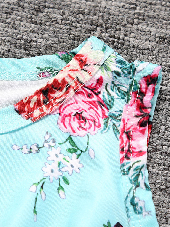 Baby Spring floral onesie with pom pom hem and matching headband