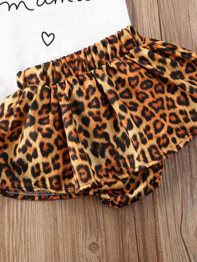 Baby set features a ruffled top with an " I got it from my Mama" print onesie and leopard skirted bloomers with a headband