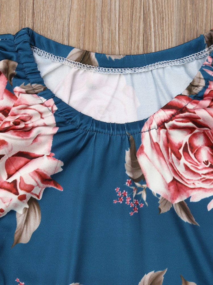 Baby set features a long-sleeved set with floral print with matching socks and a headband