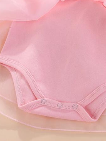 Baby set features a onesie with a tulle skirt, matching shoes, and cap