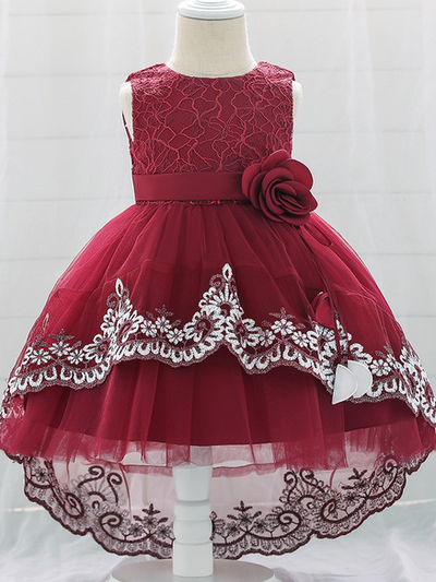 Baby dress has embroidered tulle overlay bodice and hi-lo tulle overlay skirt, removable big bow accent at the back and flower applique at the front