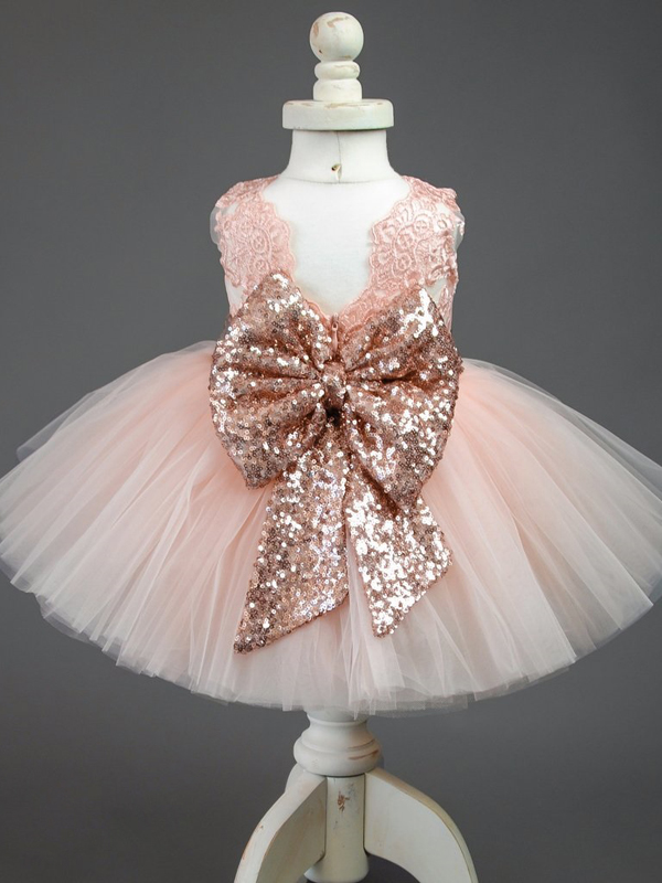 Baby tutu dress has an embroidered floral bodice, a sequin belt at the waistline with a big bow at the back, and a tutu skirt