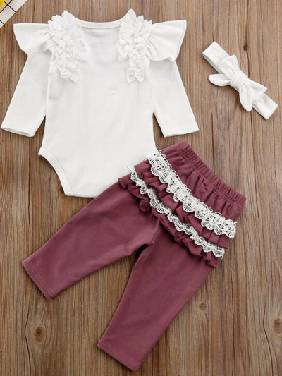 Baby set features a long-sleeved onesie with ruffled shoulders, ruffled leggings, and matching headbands