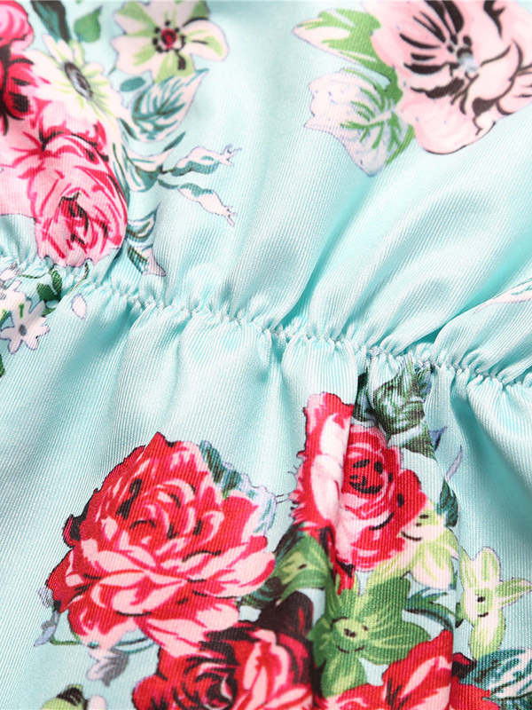 Baby Spring floral onesie with pom pom hem and matching headband 