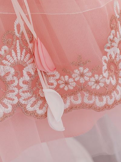 Baby dress has embroidered tulle overlay bodice and hi-lo tulle overlay skirt, removable big bow accent at the back and flower applique at the front