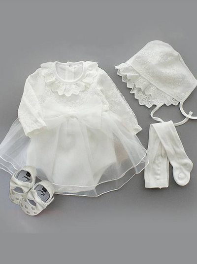 Baby set features a onesie with a tulle skirt, matching shoes, and cap