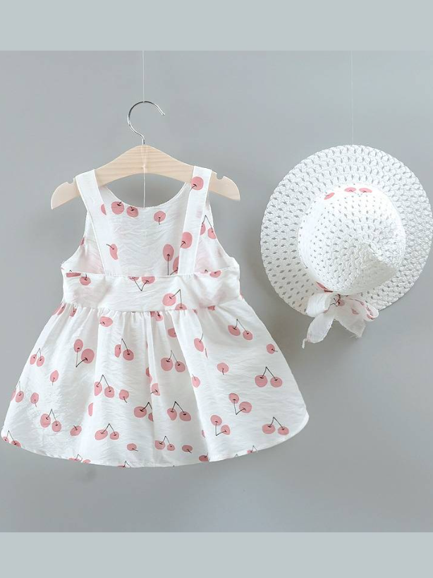 baby summer dress has an adorable cherry print and a large bow at the front and comes with a matching hat