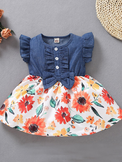 Baby Spring apron style dress has a denim bodice and floral skirt Coralsunflower front button