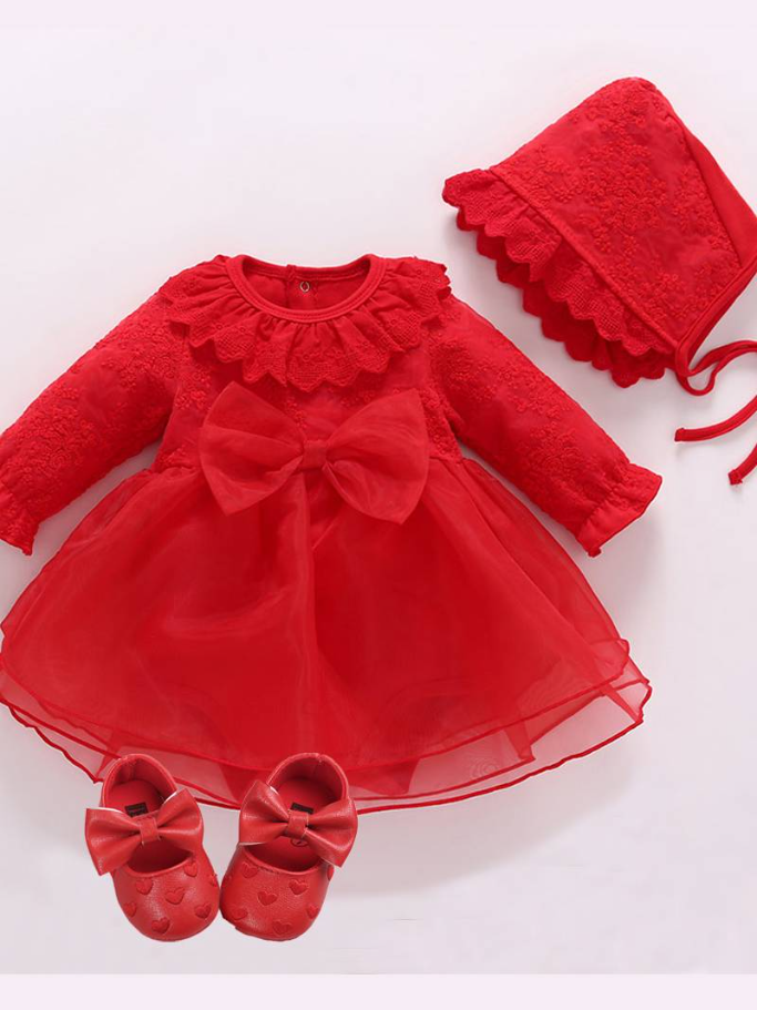 Baby set features a onesie with a tulle skirt, matching shoes, and cap