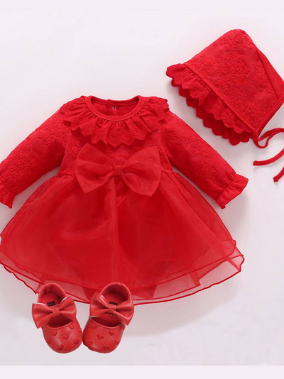 Baby set features a onesie with a tulle skirt, matching shoes, and cap
