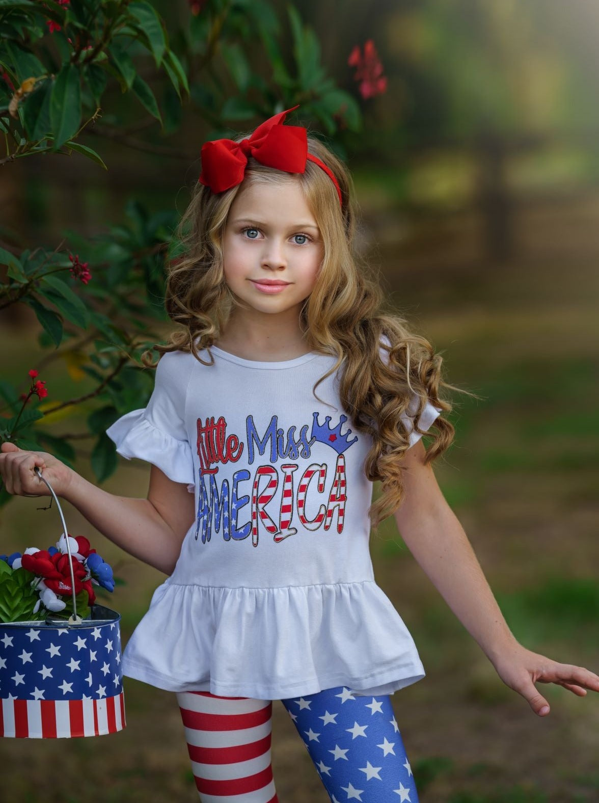 girls Set features a hi-low "Little Miss America" printed tunic with Americana leggings