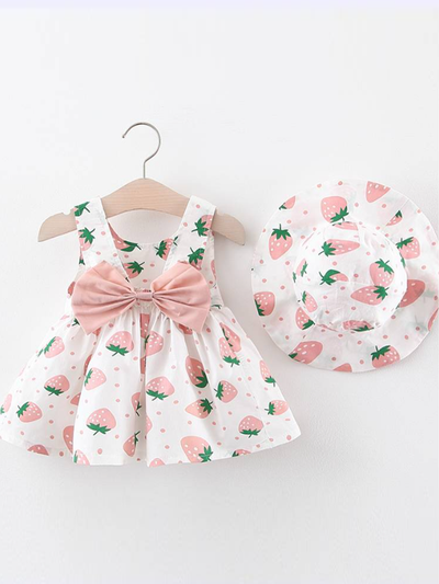 Baby dress has an adorable strawberry print and a large bow at the back and comes with a matching hat pink