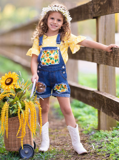 Girls Summer set features a yellow ruffle sleeve top with white polka dots and denim overall shorts with sunflower print and sequin mesh patches - 2T-10Y