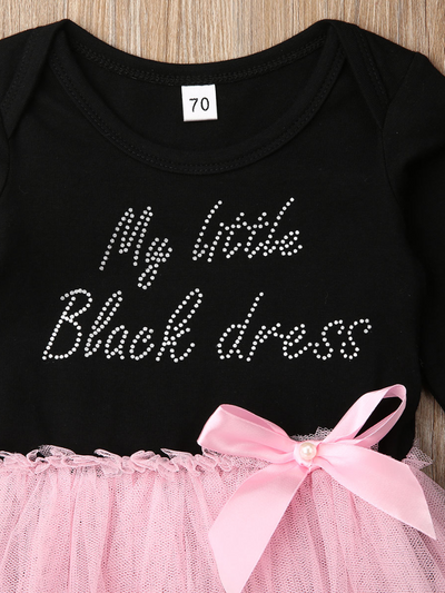 tutu dress has a long sleeved black bodice with "My Little Black Dress" in rhinestones and a tutu skirt