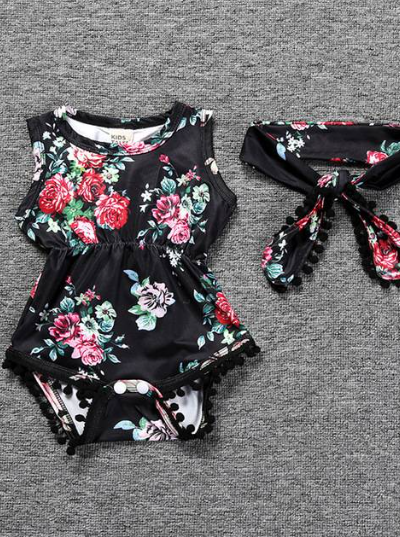 Baby Spring floral onesie with pom pom hem and matching headband black