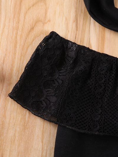 Baby Black stretchy bib with large lace bib, snap closure bottom