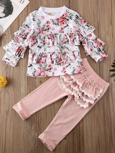 Baby set features a long-sleeved ruffled top and ruffled leggings