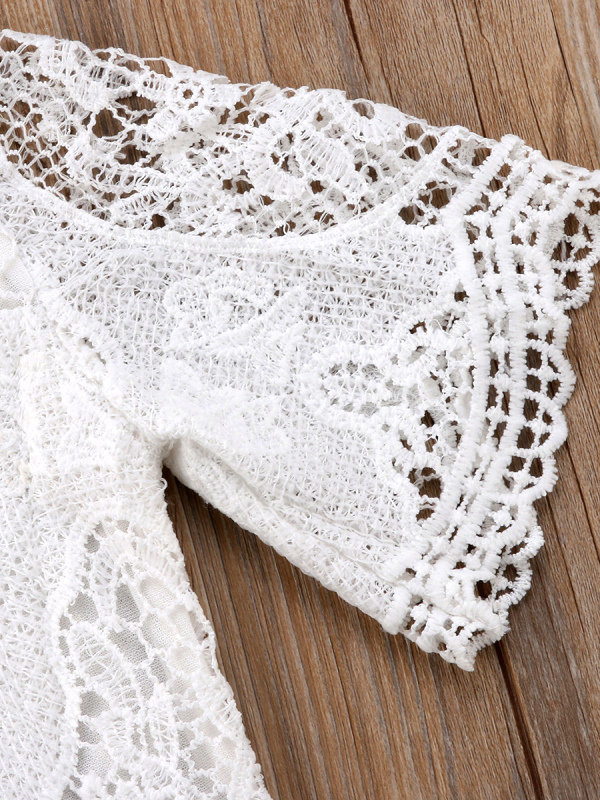Baby lace onesie has kimono style long sleeves