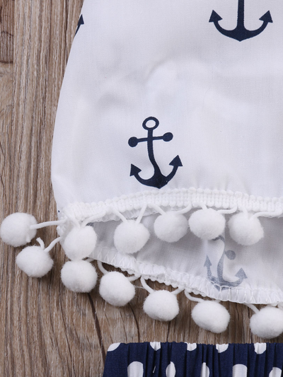 Baby set features a white halter top with an anchor print and adjustable straps with polka dot bloomer shorts