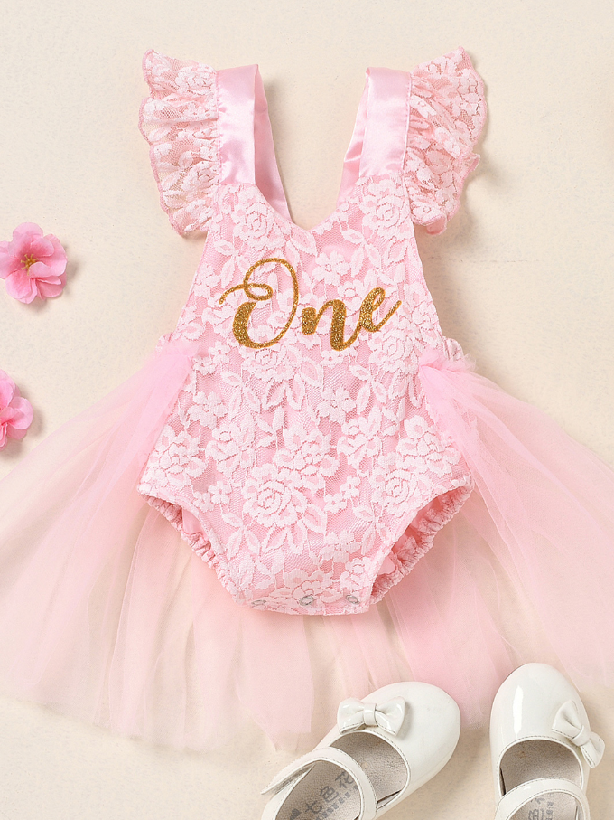 Baby lace overall onesie that ties at the back with tulle train, little ruffles at the shoulder, and a gold "One" printed on the bodice