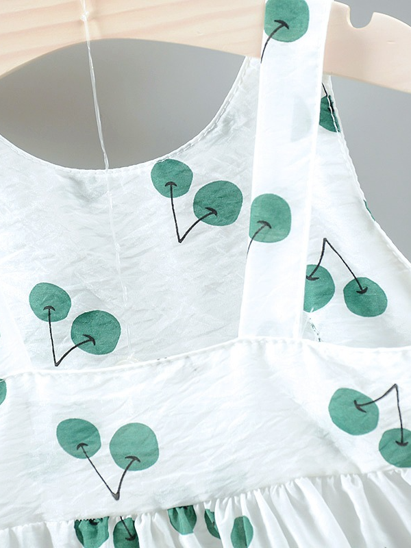 baby summer dress has an adorable cherry print and a large bow at the front and comes with a matching hat