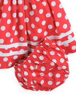 Baby red summer dress has a cute white polka dot print, a white bow at the waist and comes with matching bloomers