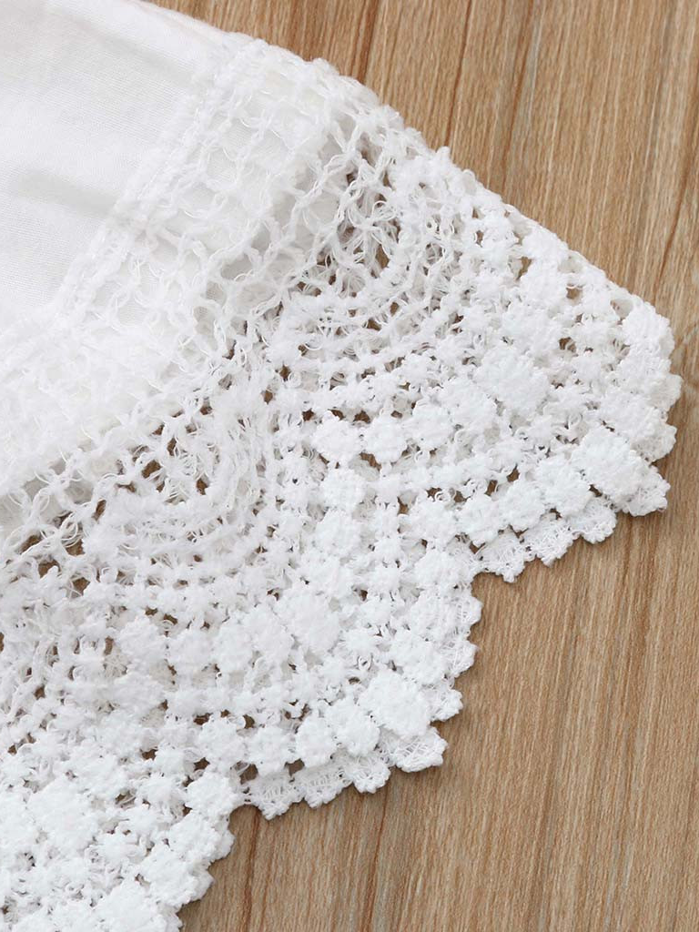 Baby set features a ruffled top with crocheted bib and denim skirted bloomers with a headband