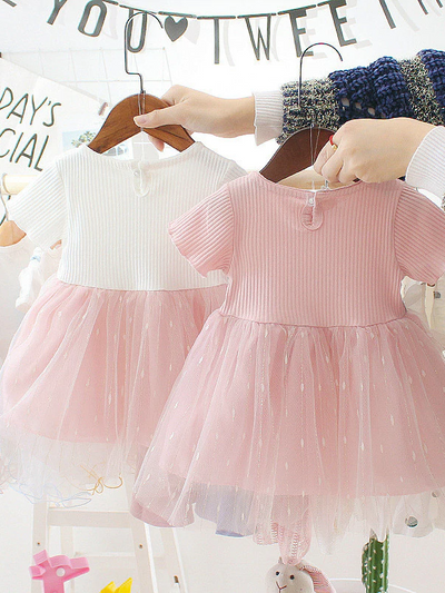 Baby Spring dress has a tulle overlay and a satin belt with a flower applique Pink-White