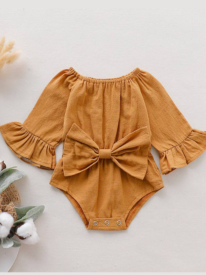 Baby boho style onesie has ruffled long sleeves and a cute bow at the front