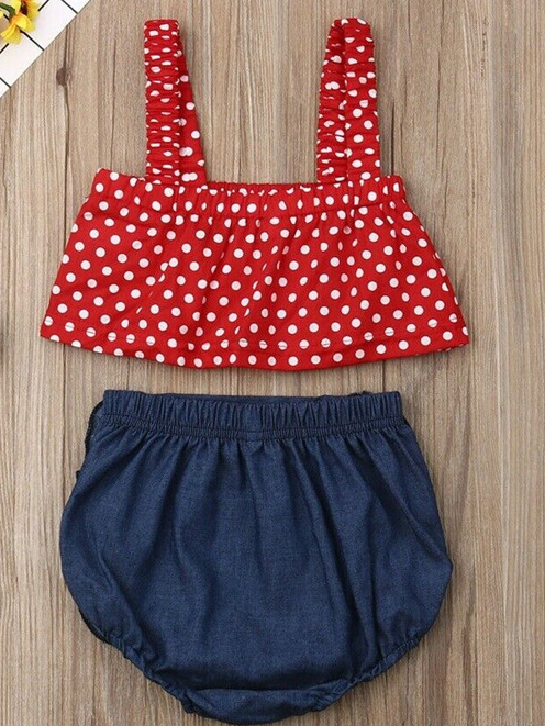 Baby set features a cropped top with polka dots and denim sailor-style bloomers